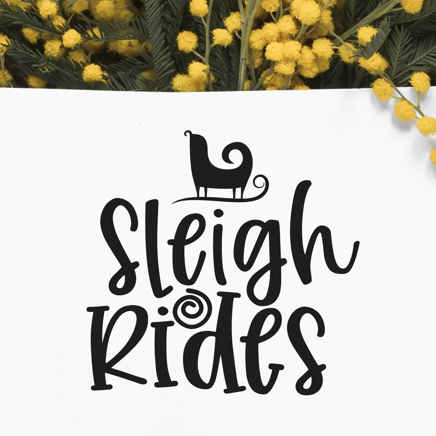 Sleigh Rides rubber stamp design with sleigh graphic, ideal for winter crafts, holiday cards, and seasonal handmade gifts.