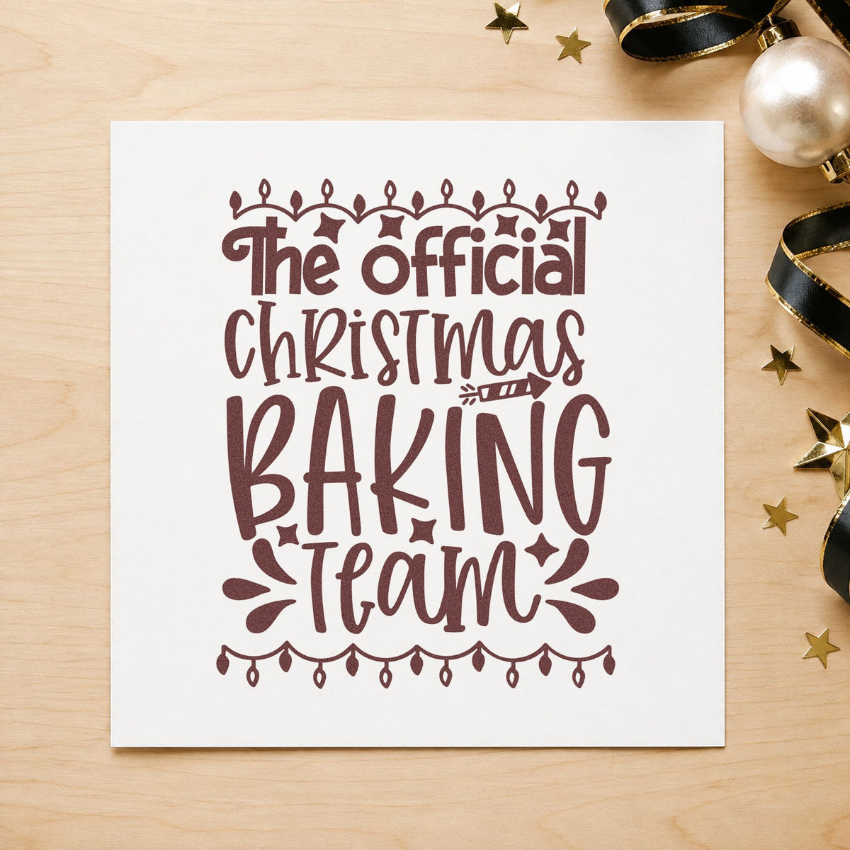 Official Christmas Baking Team rubber stamp printed in brown ink, ready for duty roster sheet and similar paper crafts.