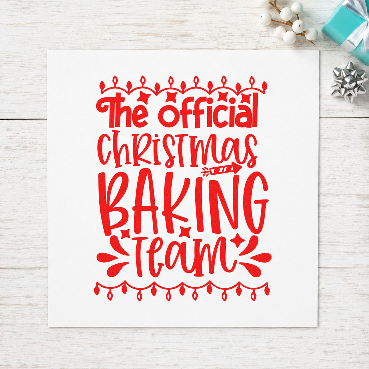 Official Christmas Baking Team craft stamp in red ink on cardstock, an easy option for uniform apron printing.