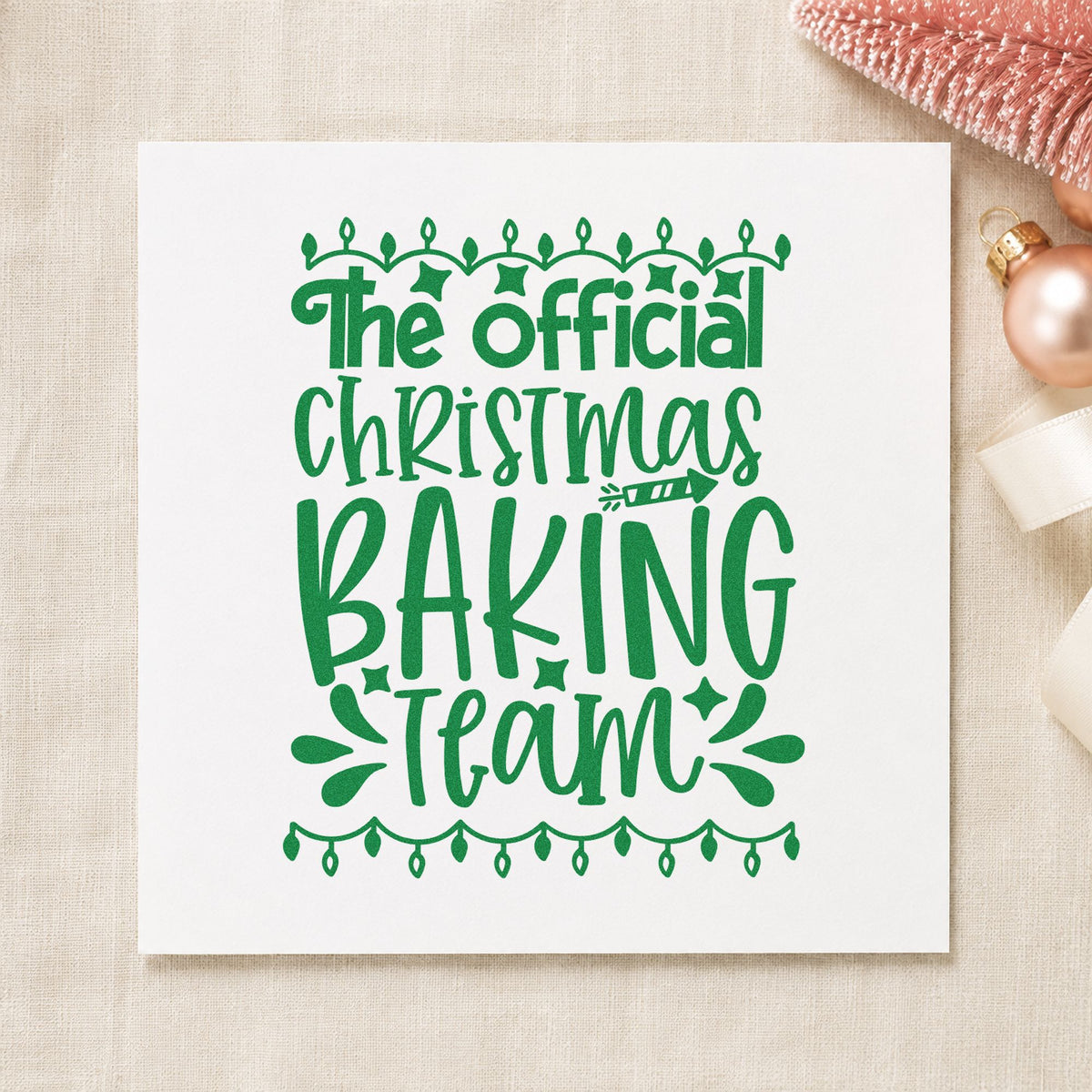 Official Christmas Baking Team craft stamp imprinted in green ink on paper, a design suited to framed kitchen entry.