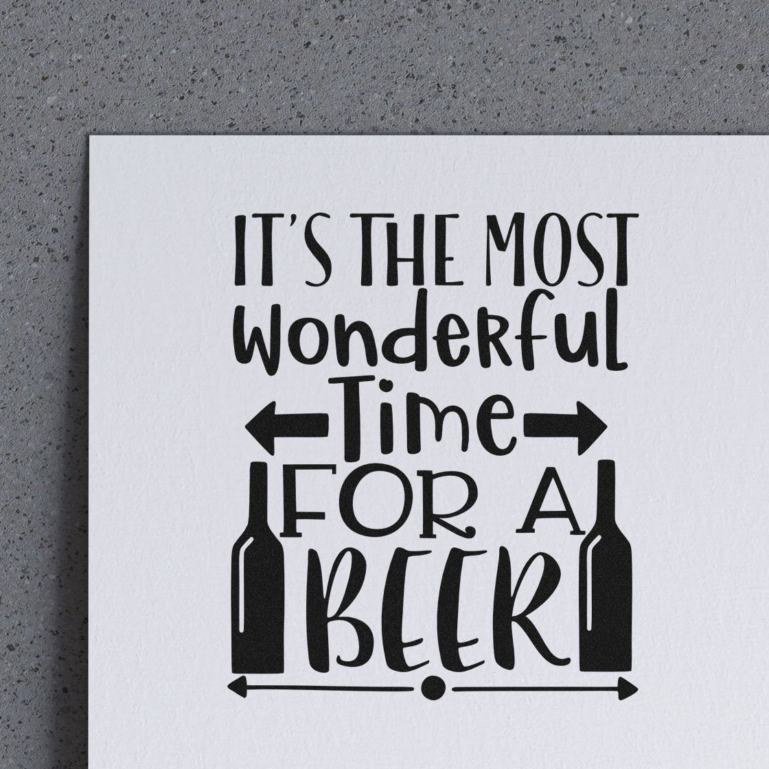 It's The Most Wonderful Time For A Beer Premium Wood-Mounted Stamp - Vintage Pro imprint stamped in black ink. "It's the Most Wonderful Time for a Beer" features two bottles and horizontal arrows.