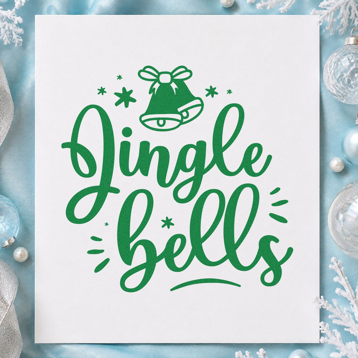 Jingle Bells Bow Bell craft stamp imprinted in green ink on paper, a design suited to framed door header.