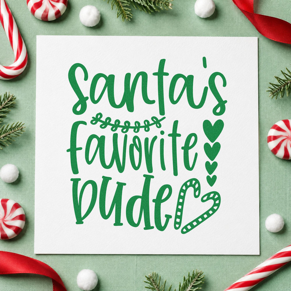 Santa's Favorite Wife Hearts craft stamp imprinted in green ink on paper, a design suited to framed dresser top.