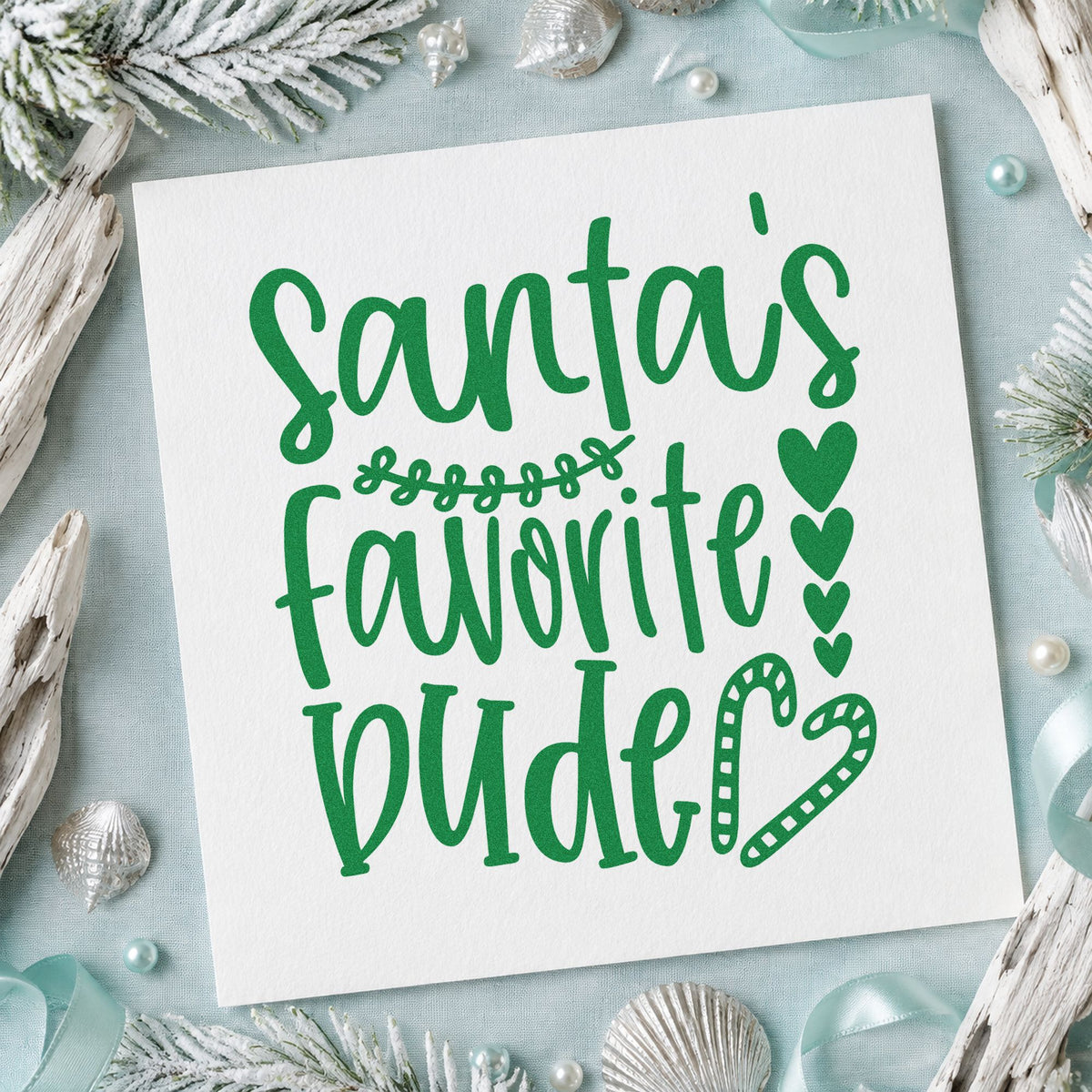Santa's Favorite Wife Hearts craft stamp imprint in green ink on a handmade project, one idea being anniversary cards.