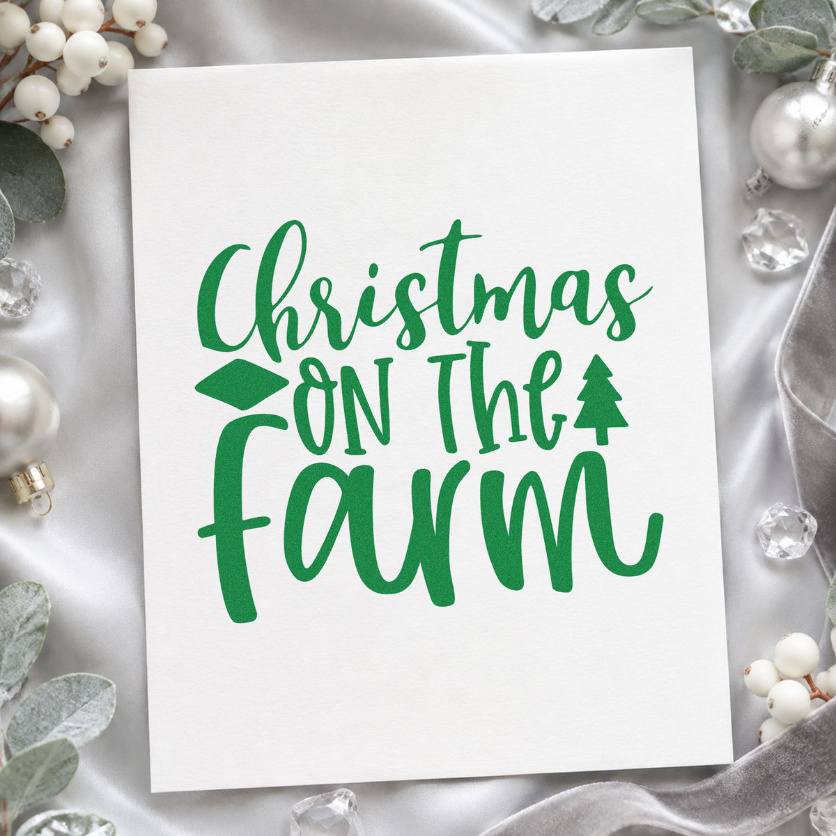 Christmas On The Farm craft stamp imprint in green ink on a handmade project, one idea being egg carton gift tags.