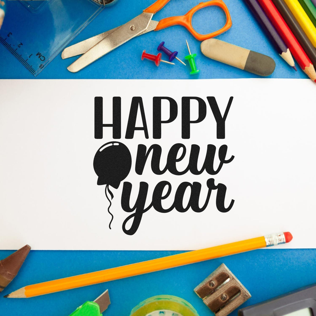 Happy New Year Balloon Premium Wooden Stamp - Vintage Pro imprint stamped in black ink. The greeting "Happy new year" includes a balloon with a curling string.