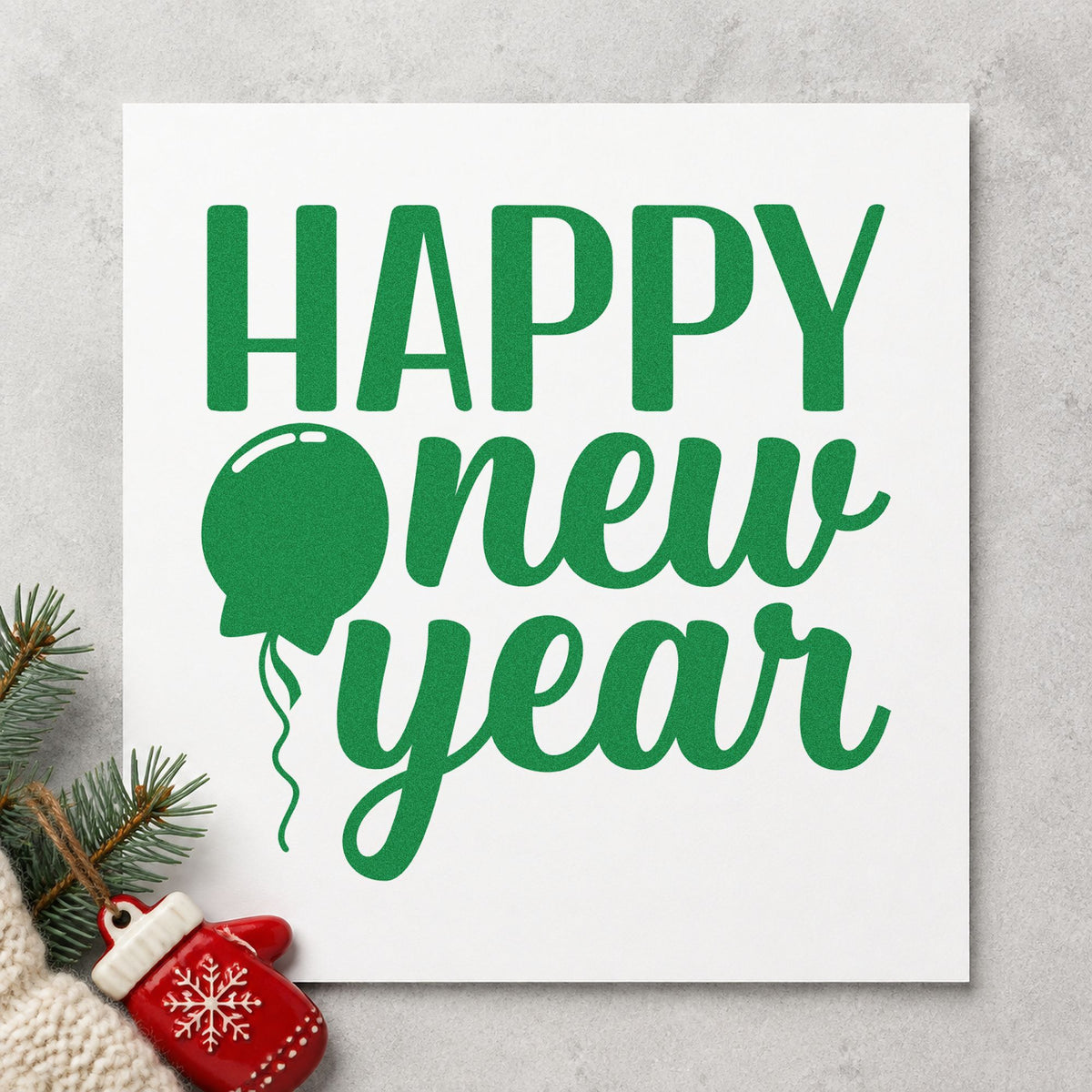 Happy New Year Balloon craft stamp imprint in green ink on a handmade project, one idea being office resolution cards.