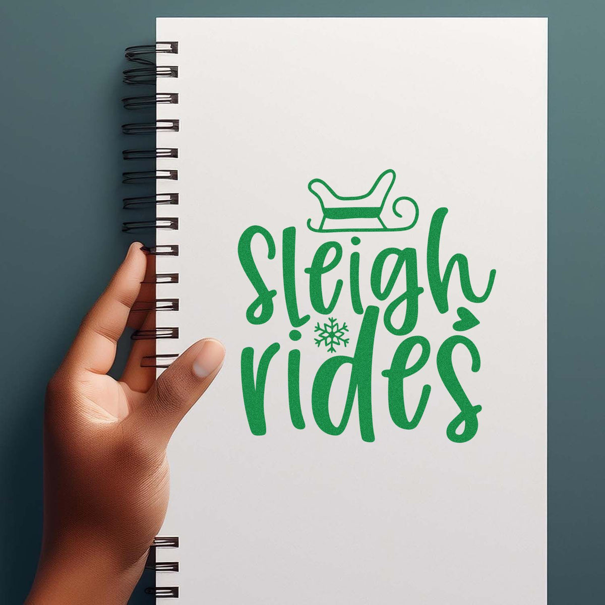 Sleigh Rides Winter Lettering rubber stamp shown in green ink, stamped for projects such as guide log album page.