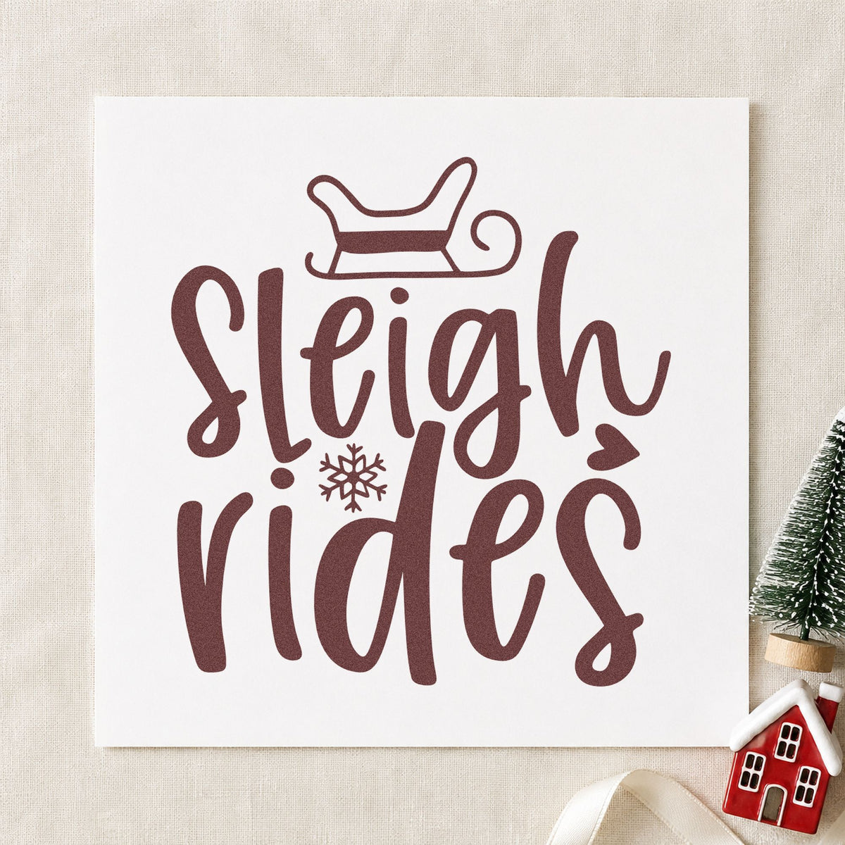Sleigh Rides Winter Lettering rubber stamp printed in brown ink, ready for trail report sheet and similar paper crafts.