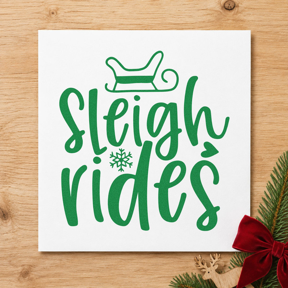 Sleigh Rides Winter Lettering craft stamp imprinted in green ink on paper, a design suited to framed trailhead board.
