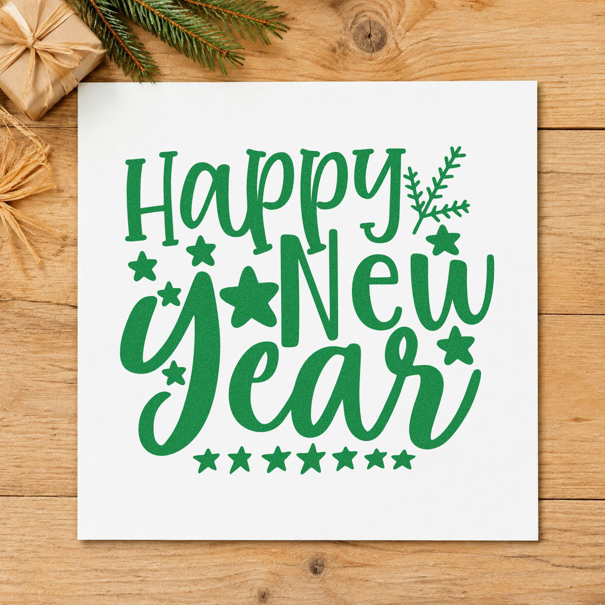 Happy New Year Stars craft stamp imprint in green ink on a handmade project, one idea being brunch menu cards.