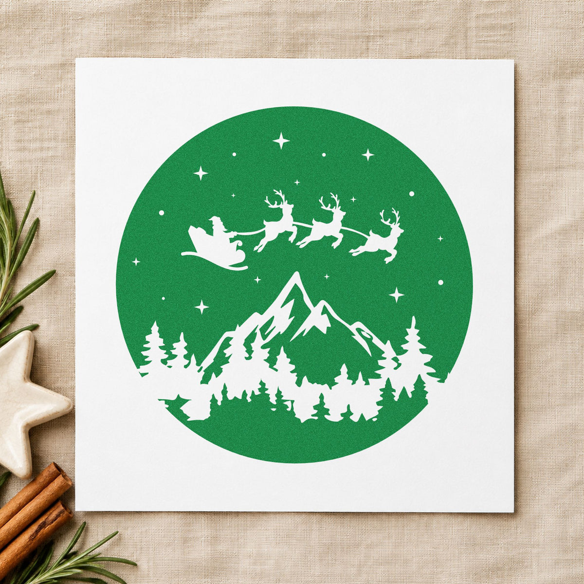 Santa Sleigh Mountain Night craft stamp imprint in green ink on a handmade project, one idea being planetarium cards.