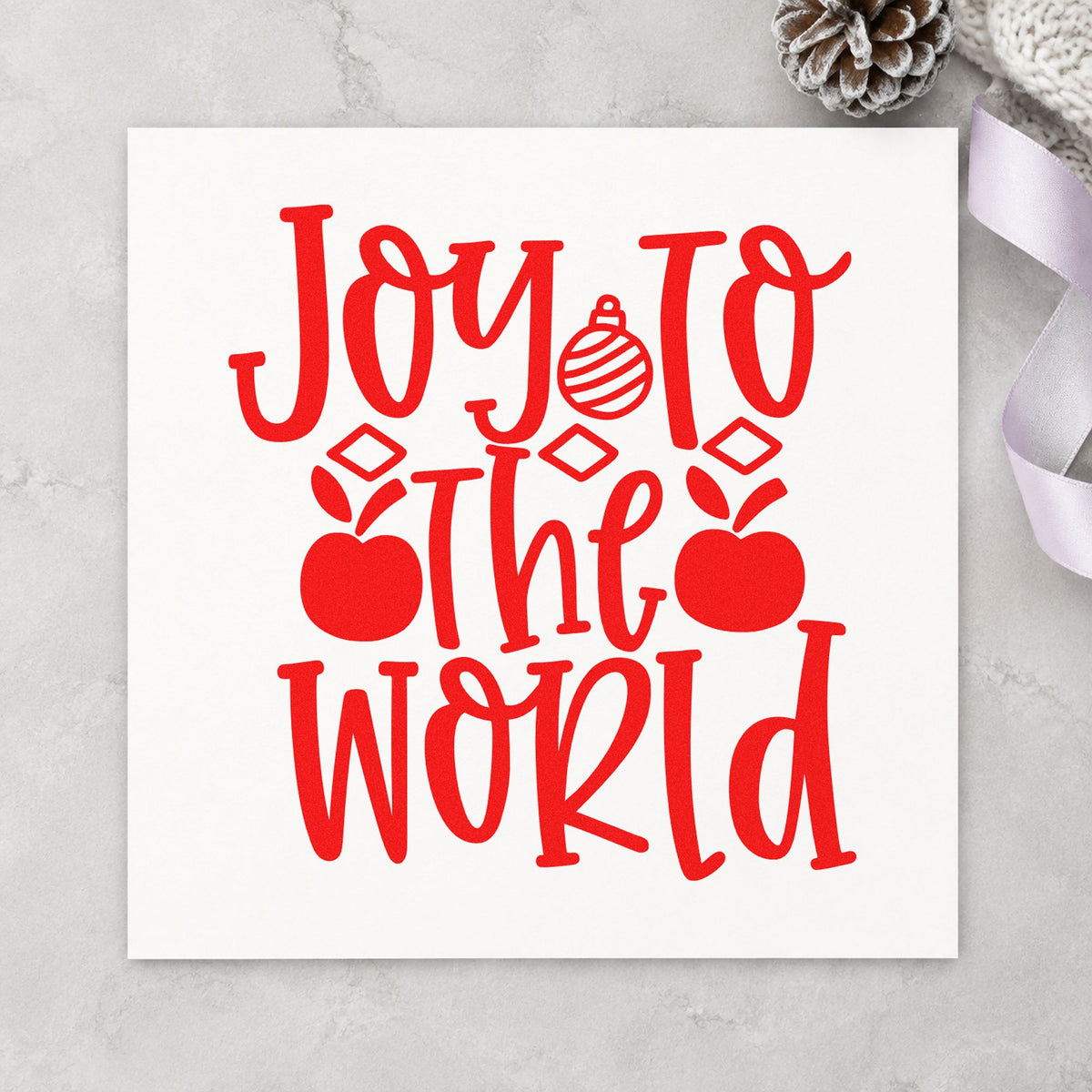 Joy To The World Ornaments craft stamp in red ink on cardstock, an easy option for garland tie printing.
