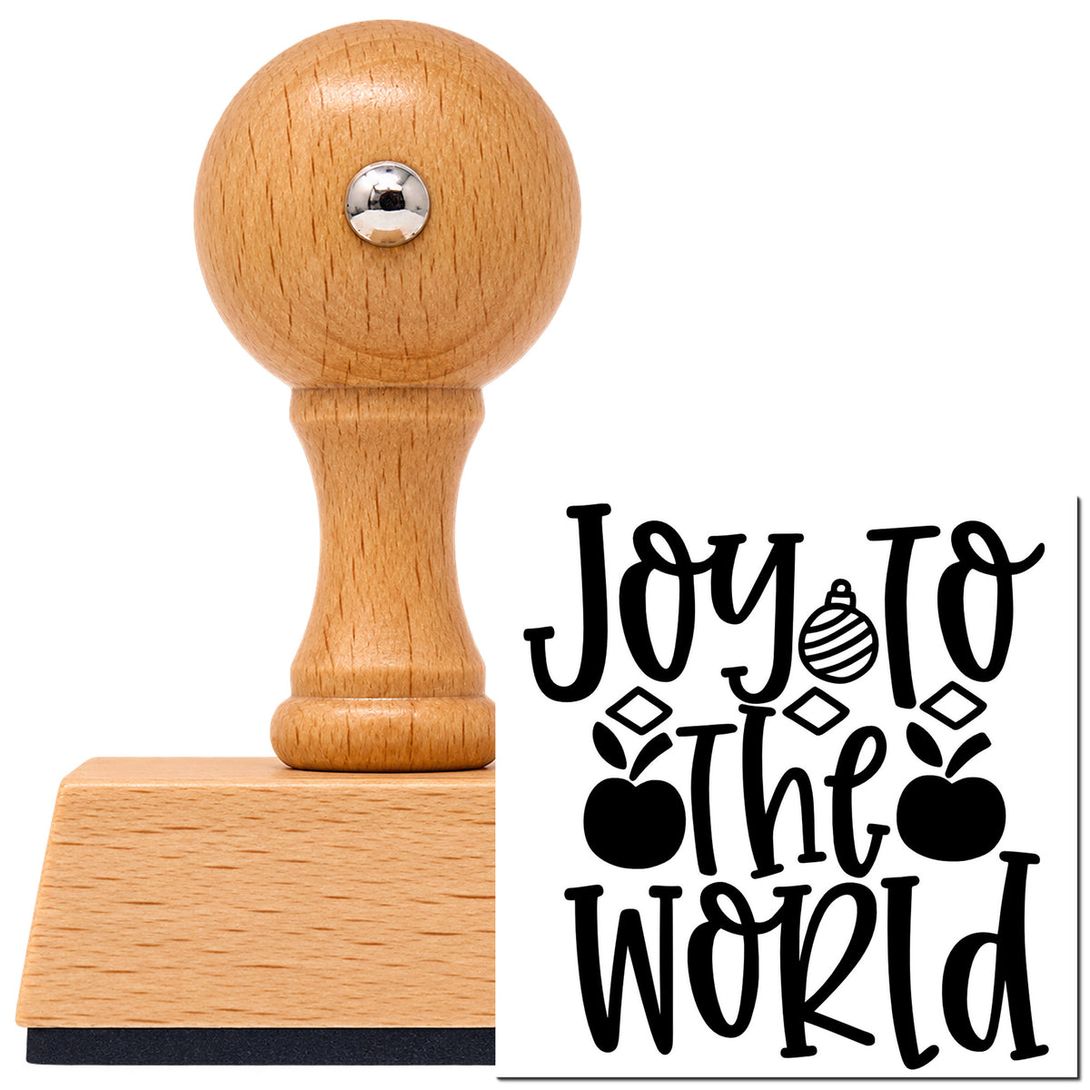Joy To The World Ornaments Vintage Pro rubber stamp in European beech wood with a round knob handle, shown beside its black imprint.
