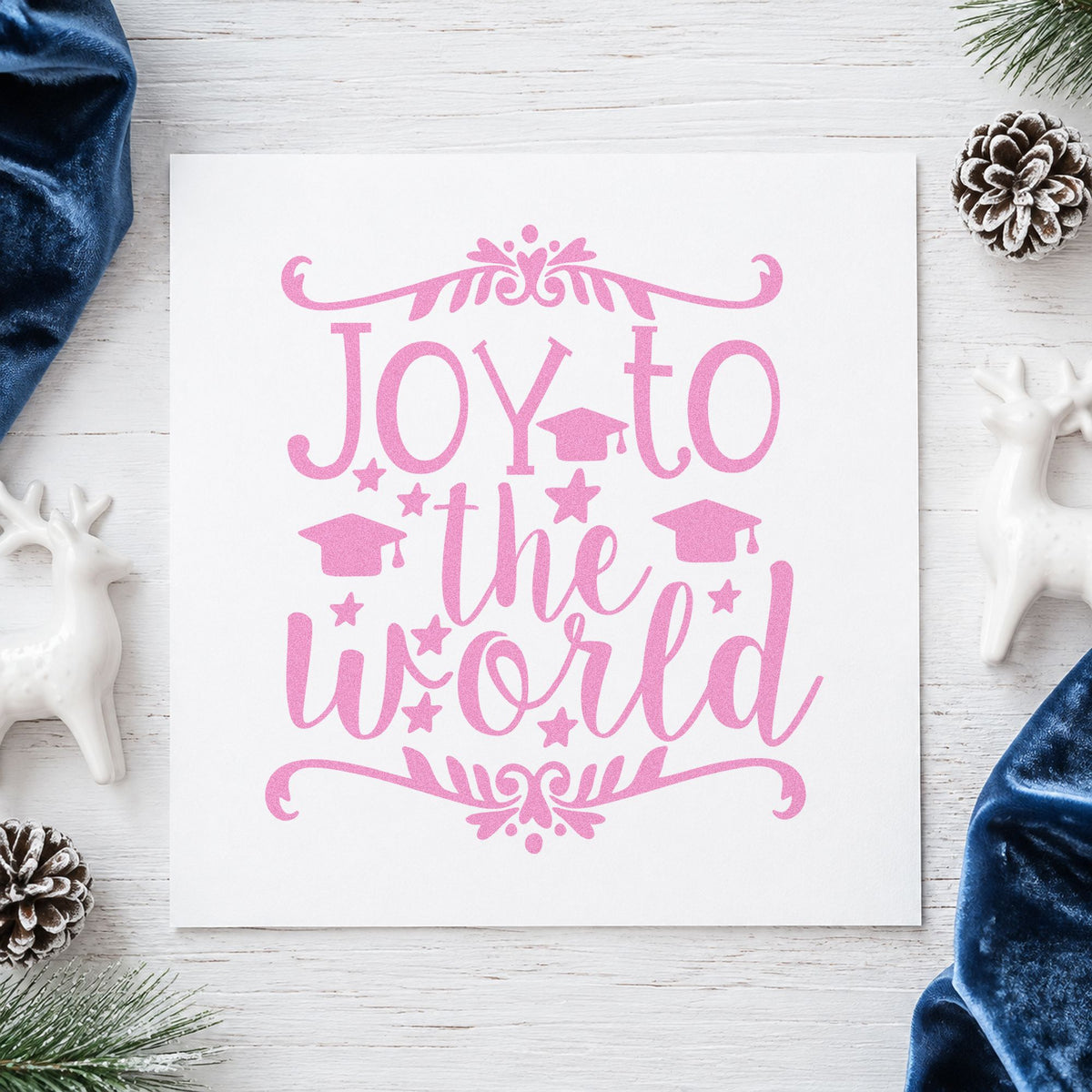 Joy To The World Flourishes craft stamp in purple ink on cardstock, an easy option for grad album page.