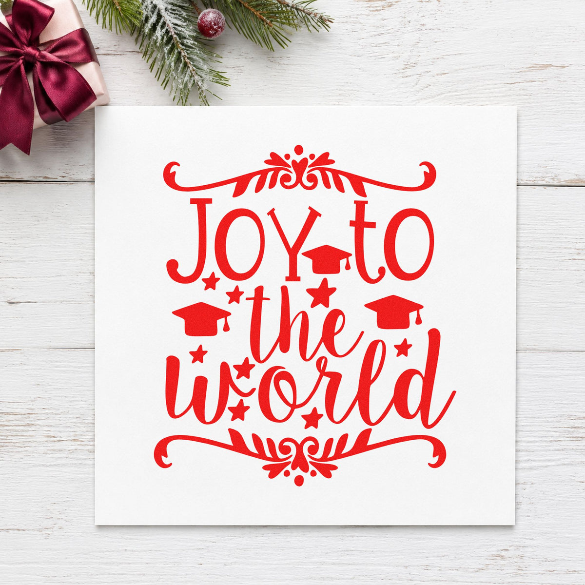 Joy To The World Flourishes rubber stamp shown in red ink, stamped for projects such as move box labels.