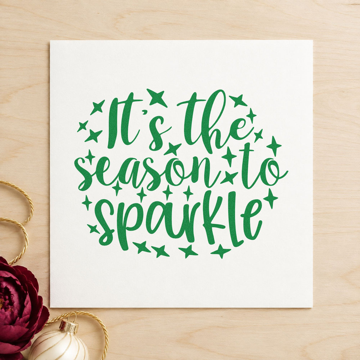 Season To Sparkle Stars craft stamp imprint in green ink on a handmade project, one idea being glam night placards.