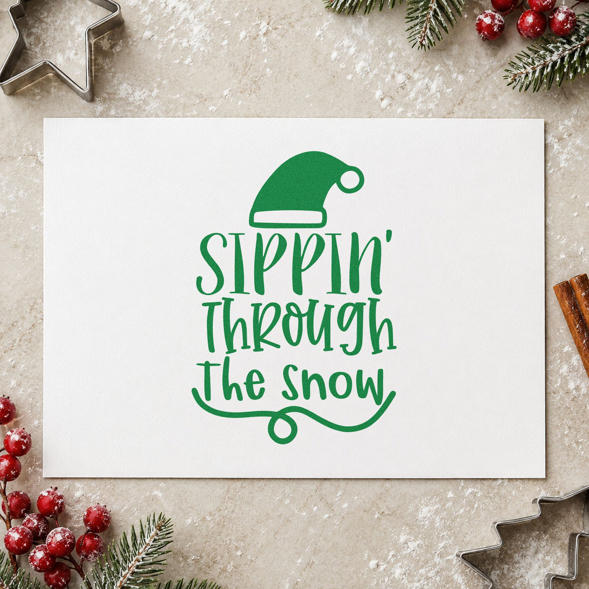 Sippin Through The Snow craft stamp imprinted in green ink on paper, a design suited to framed bar back.