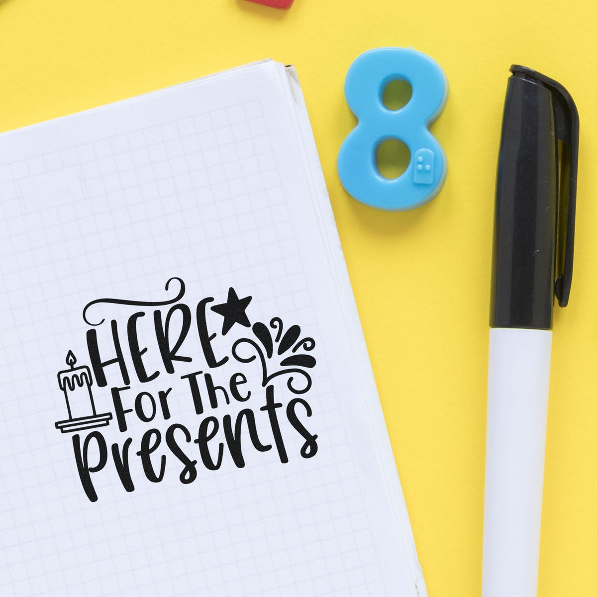 Here For The Presents Candles Stamp - Premium Vintage Pro Wooden imprint stamped in black ink. The words "Here for the presents" appear with a candle, star, and decorative splashes.