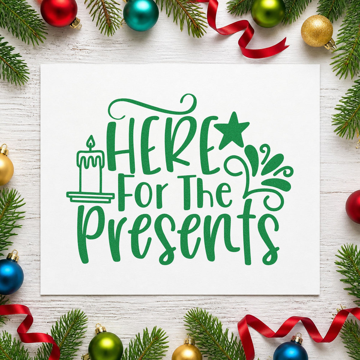 Here For The Presents craft stamp imprint in green ink on a handmade project, one idea being swap number tags.