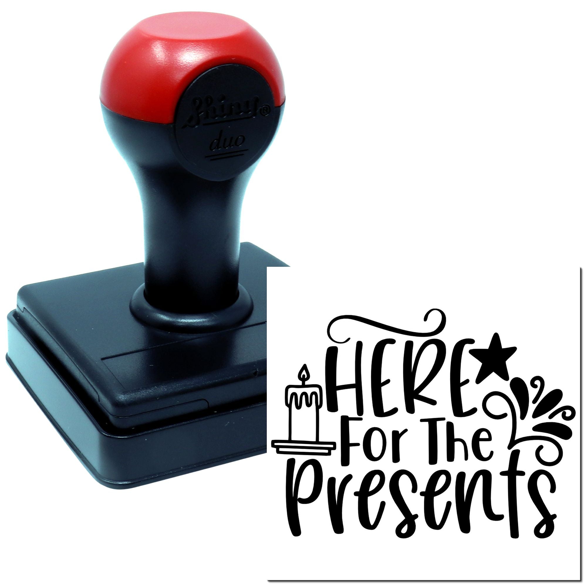Self-inking rubber stamp with Here For The Presents design for holiday gift tags, cards, and festive packaging.