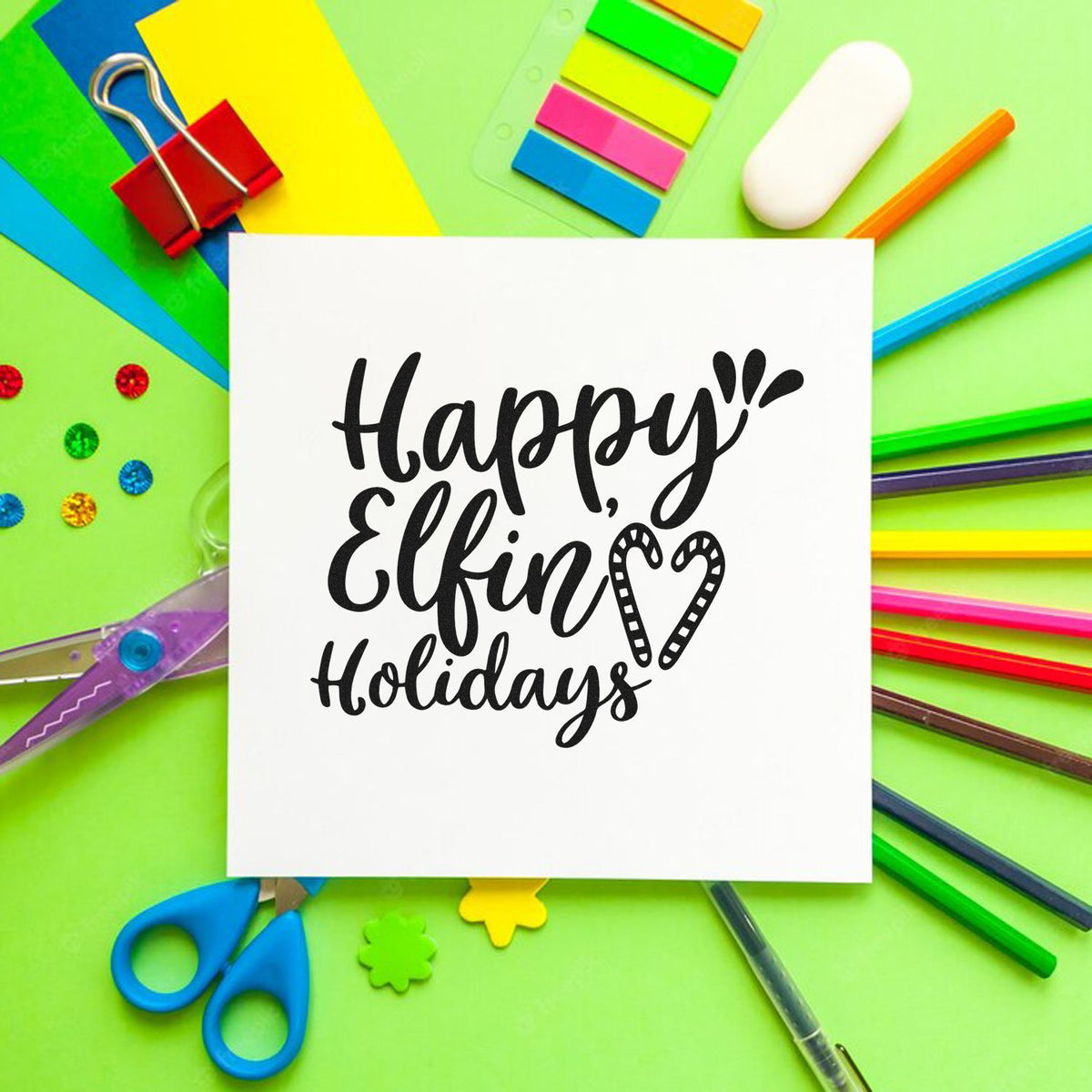 Happy Elfin Holidays Premium Wooden Stamp - Vintage Pro imprint stamped in black ink. The greeting "Happy elfin holidays" includes a patterned heart and decorative strokes.