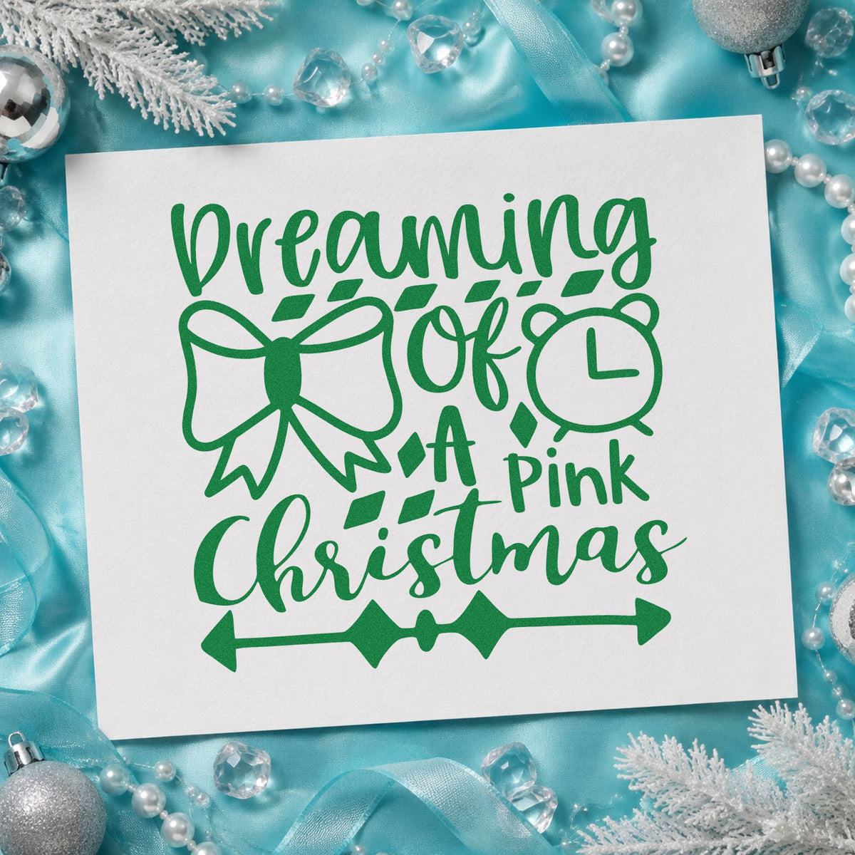 Dreaming Of A Pink Christmas craft stamp imprint in green ink on a handmade project, one idea being theme party cards.
