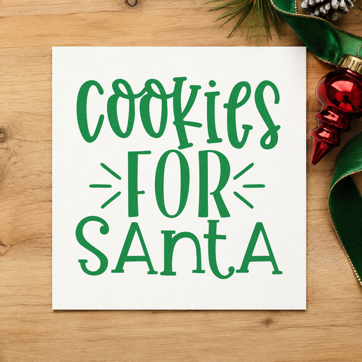 Cookies For Santa Lettering craft stamp imprint in green ink on a handmade project, one idea being three line gift tags.