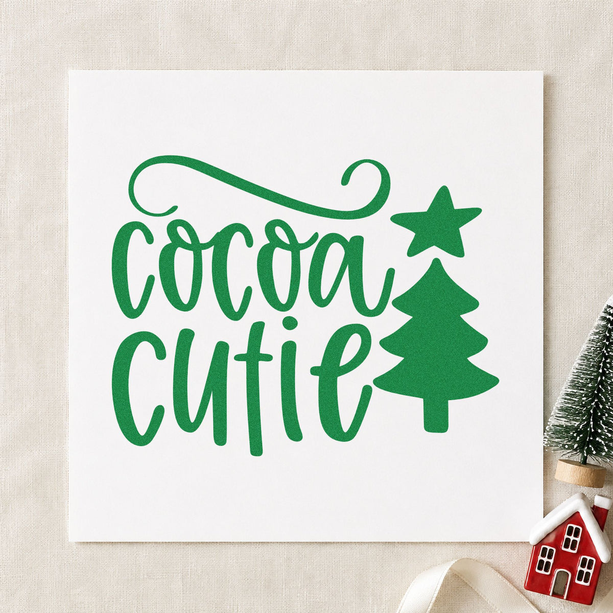 Cocoa Cutie Christmas Tree craft stamp imprint in green ink on a handmade project, one idea being sippy cup gift tags.