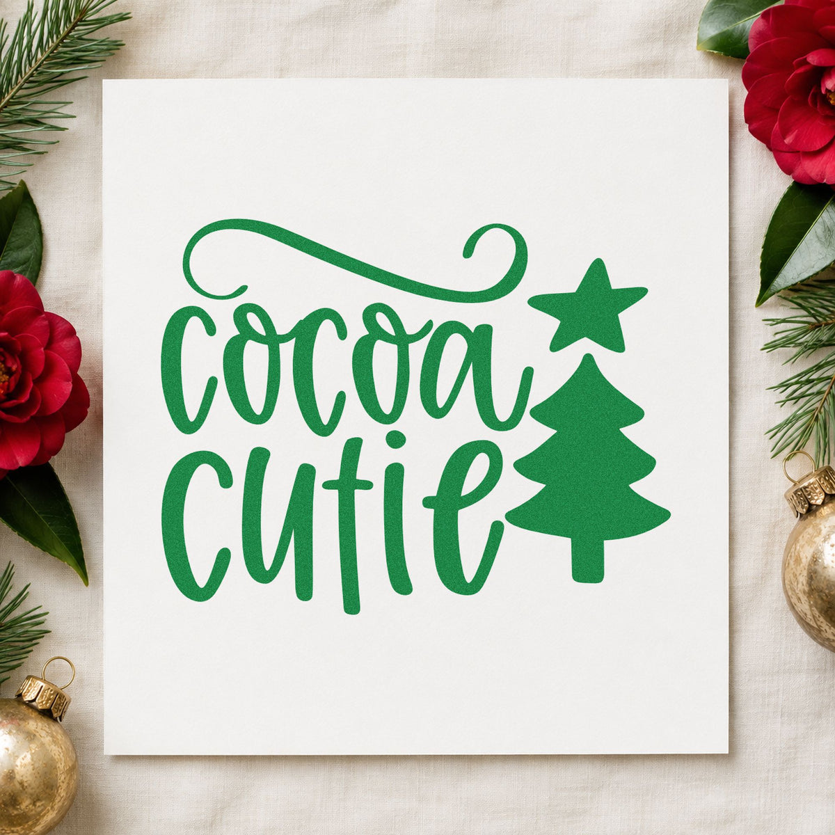 Cocoa Cutie Christmas Tree craft stamp imprint in green ink on a handmade project, one idea being play date cards.