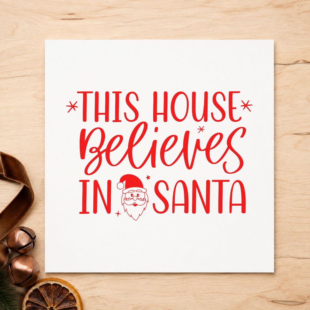 This House Believes In Santa craft stamp in red ink on cardstock, an easy option for garden flag printing.