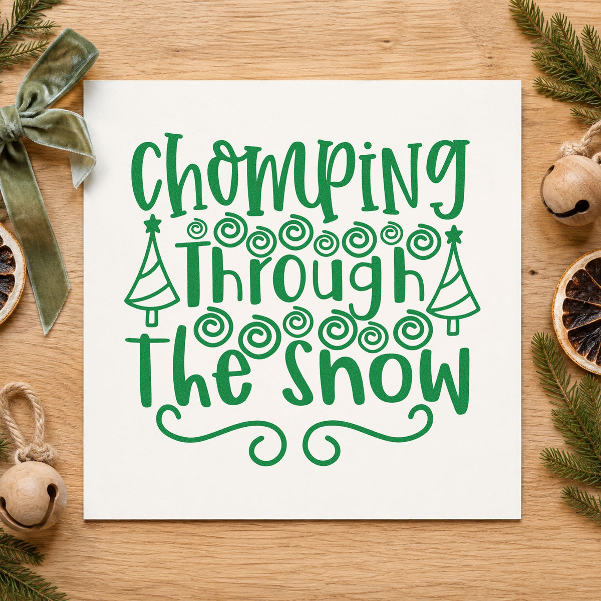 Chomping Through The Snow craft stamp imprint in green ink on a handmade project, one idea being twist wrap tags.