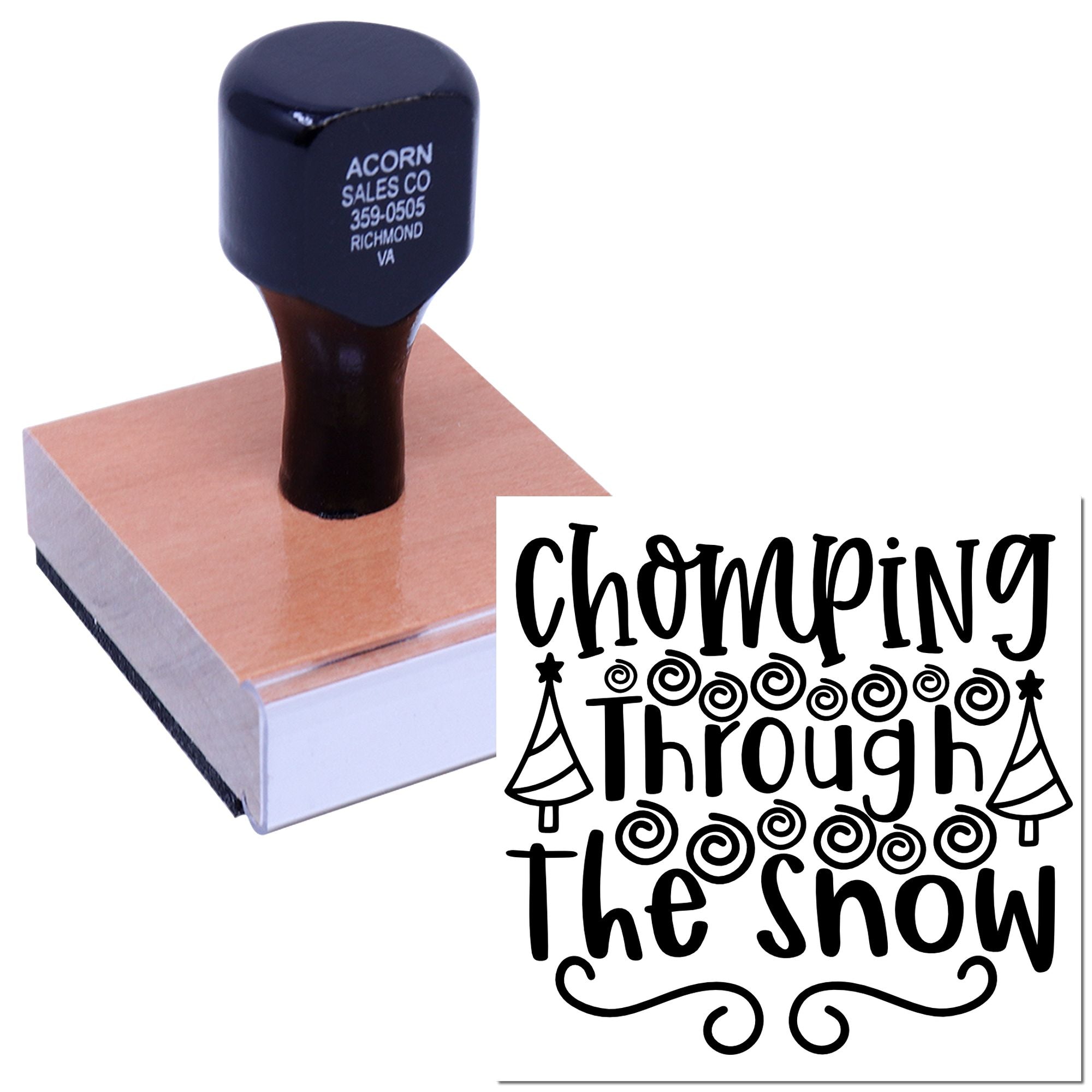Custom rubber stamp imprint reading "Chomping Through the Show" with decorative trees and swirls for event branding.