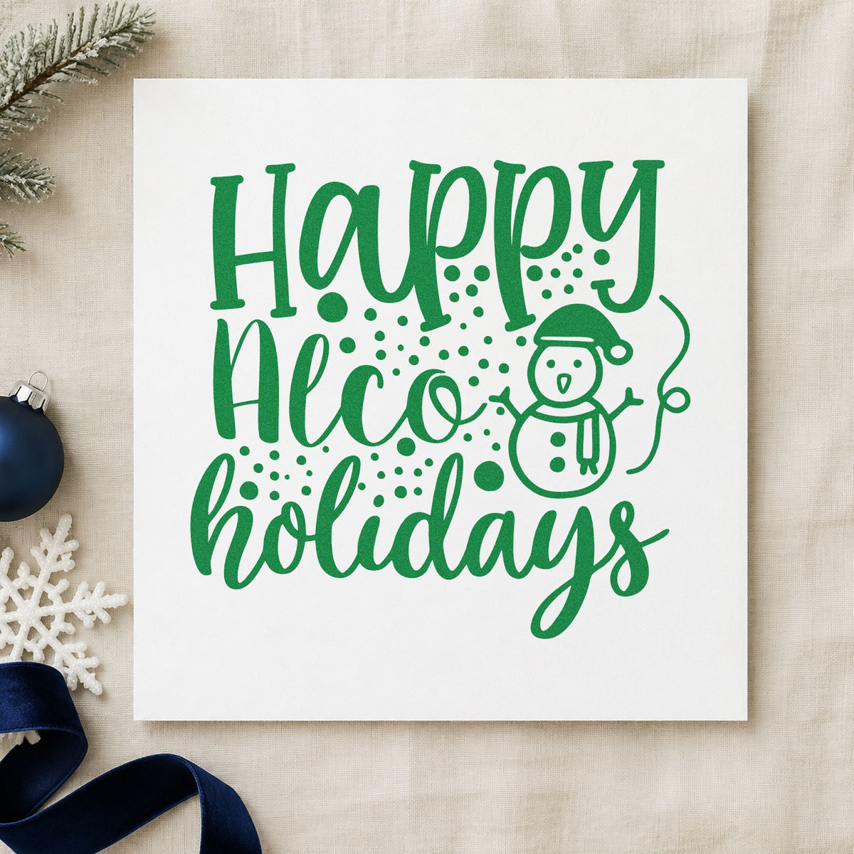 Happy Alco Holidays Snowman craft stamp imprint in green ink on a handmade project, one idea being toast order cards.