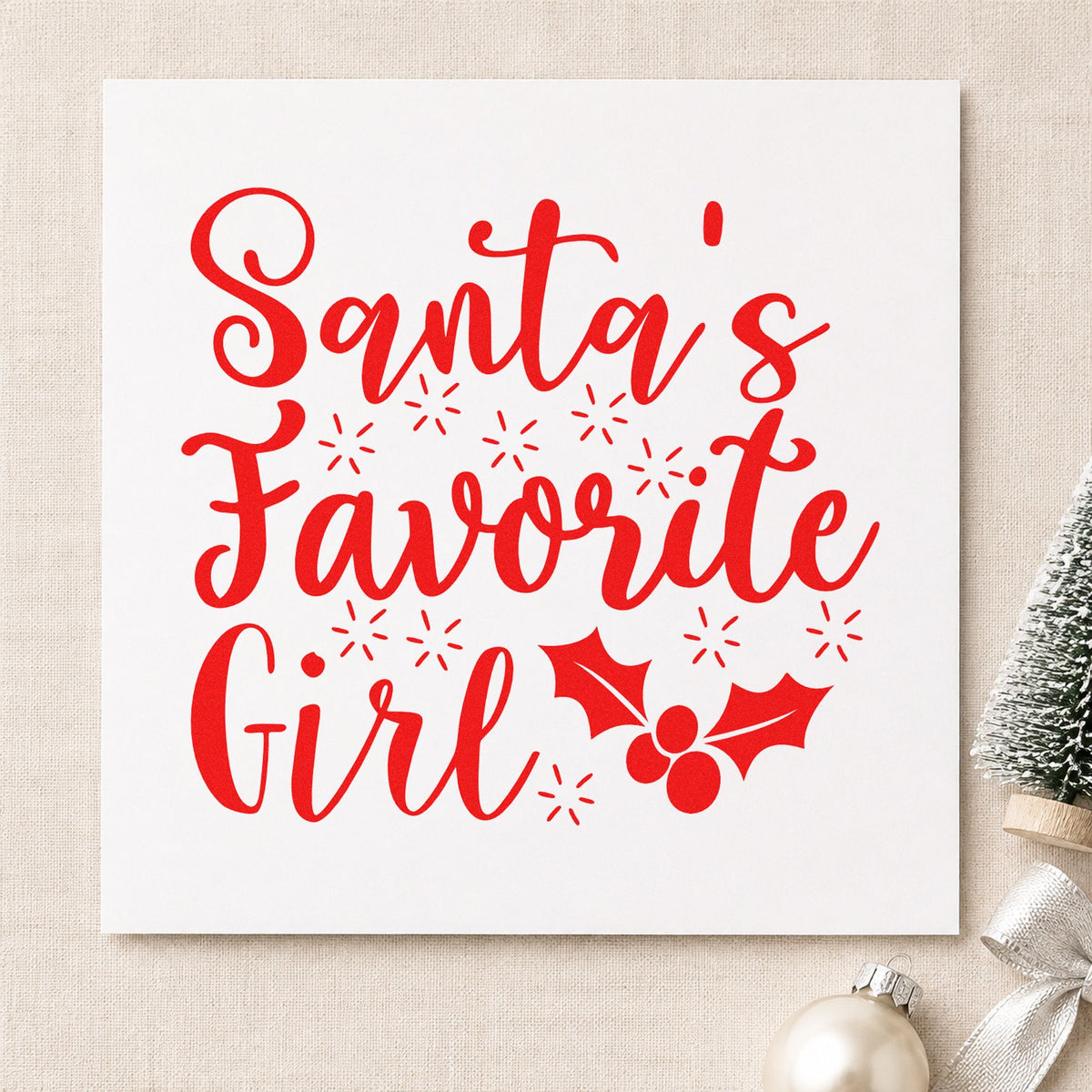 Santa's Favorite Girl Holly craft stamp in red ink on cardstock, an easy option for dress hem printing.