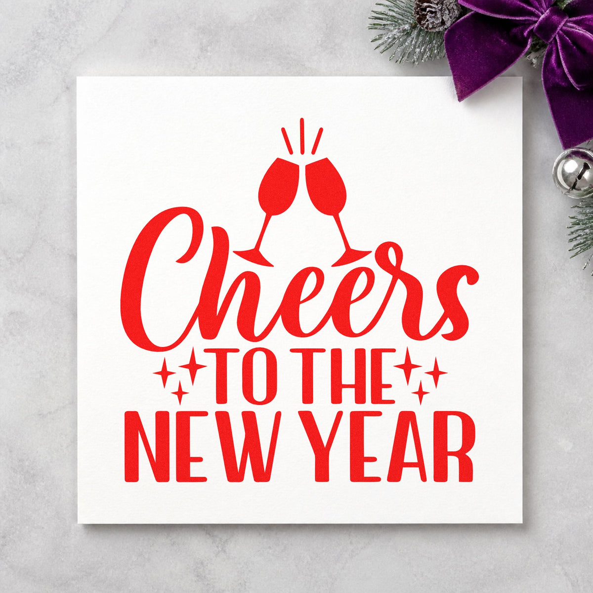 Cheers To The New Year craft stamp in red ink on cardstock, an easy option for napkin fold printing.