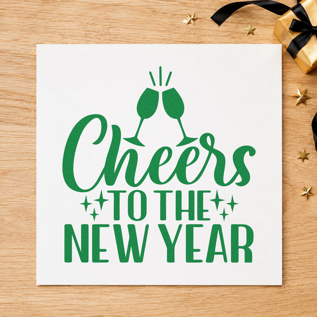 Cheers To The New Year craft stamp imprinted in green ink on paper, a design suited to framed bar mirror.