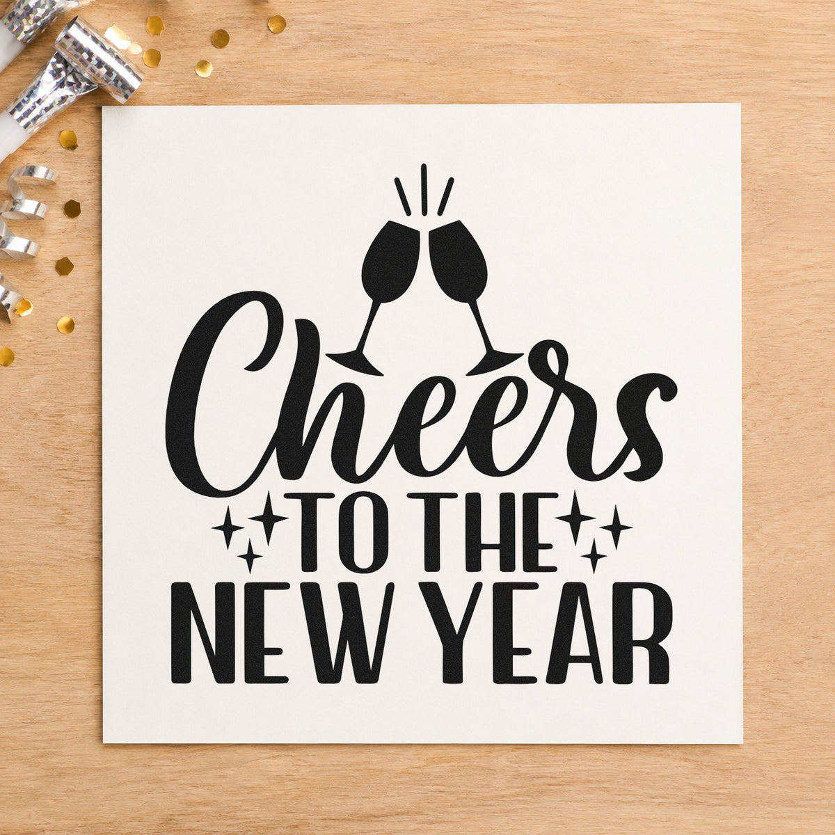 Cheers To The New Year rubber stamp printed in black ink, ready for clinking toast cards and similar paper crafts.