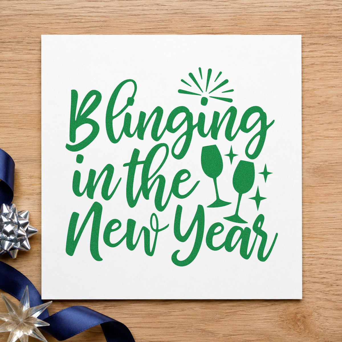 Blinging In The New Year craft stamp imprint in green ink on a handmade project, one idea being ring box gift tags.