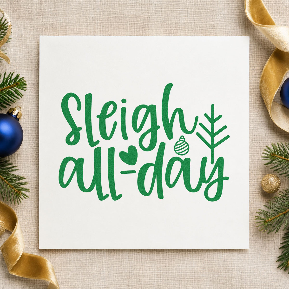 Sleigh All Day Arrow craft stamp imprint in green ink on a handmade project, one idea being shop bag gift tags.