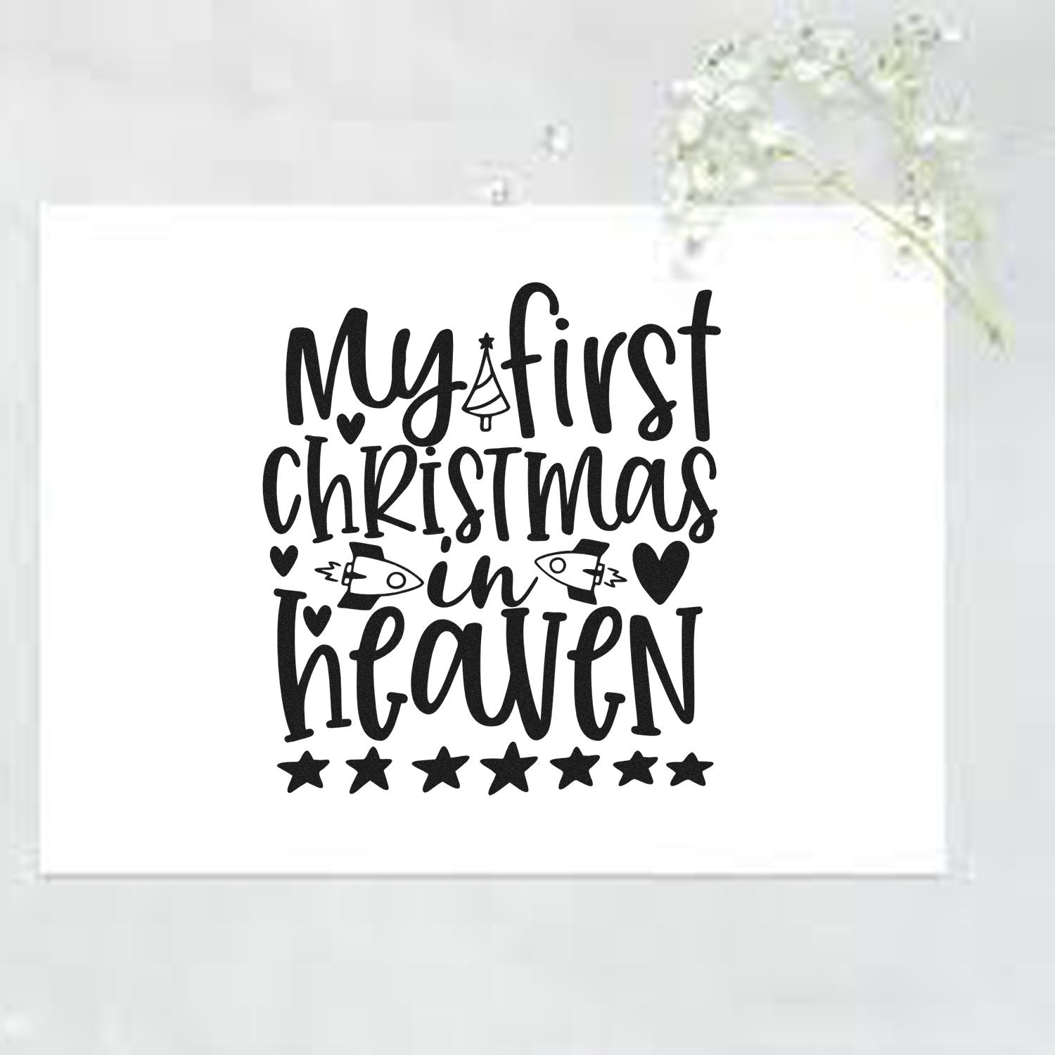 My First Christmas in Heaven rubber stamp design with hearts, stars and holiday lettering for memorial Christmas crafts.