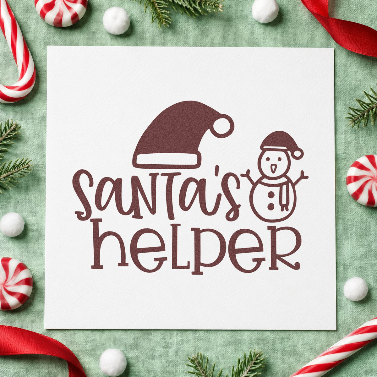 Santa's Helper Hat Snowman rubber stamp printed in brown ink, ready for outdoor chore sheet and similar paper crafts.