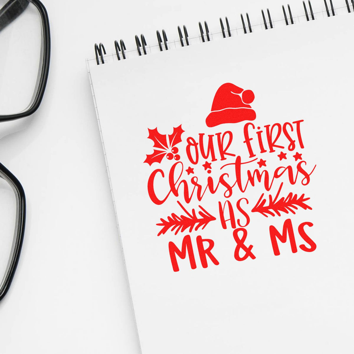 Our First Christmas Mr and Ms rubber stamp shown in red ink, stamped for projects such as first home album.