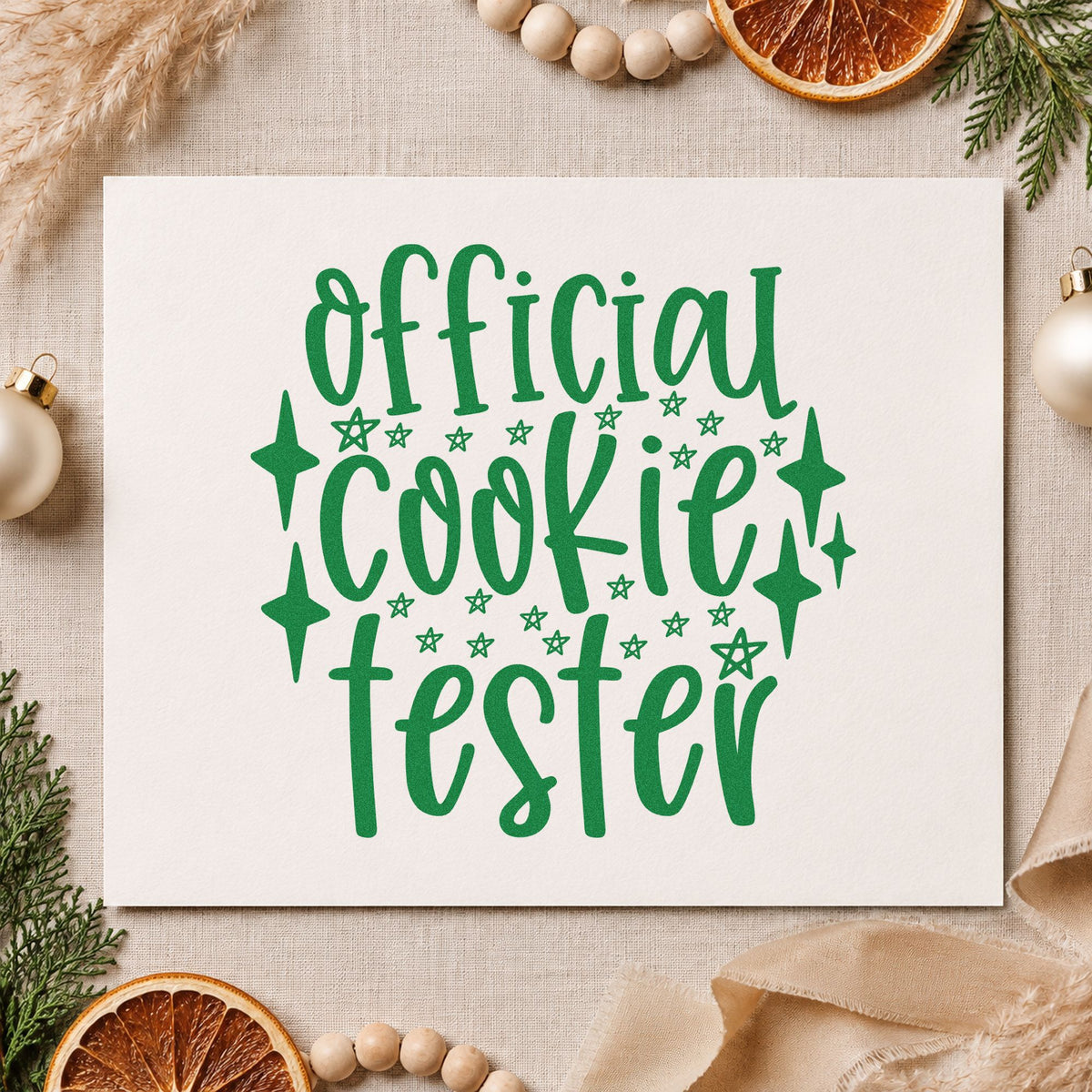Official Cookie Tester Stars craft stamp imprint in green ink on a handmade project, one idea being judging panel cards.