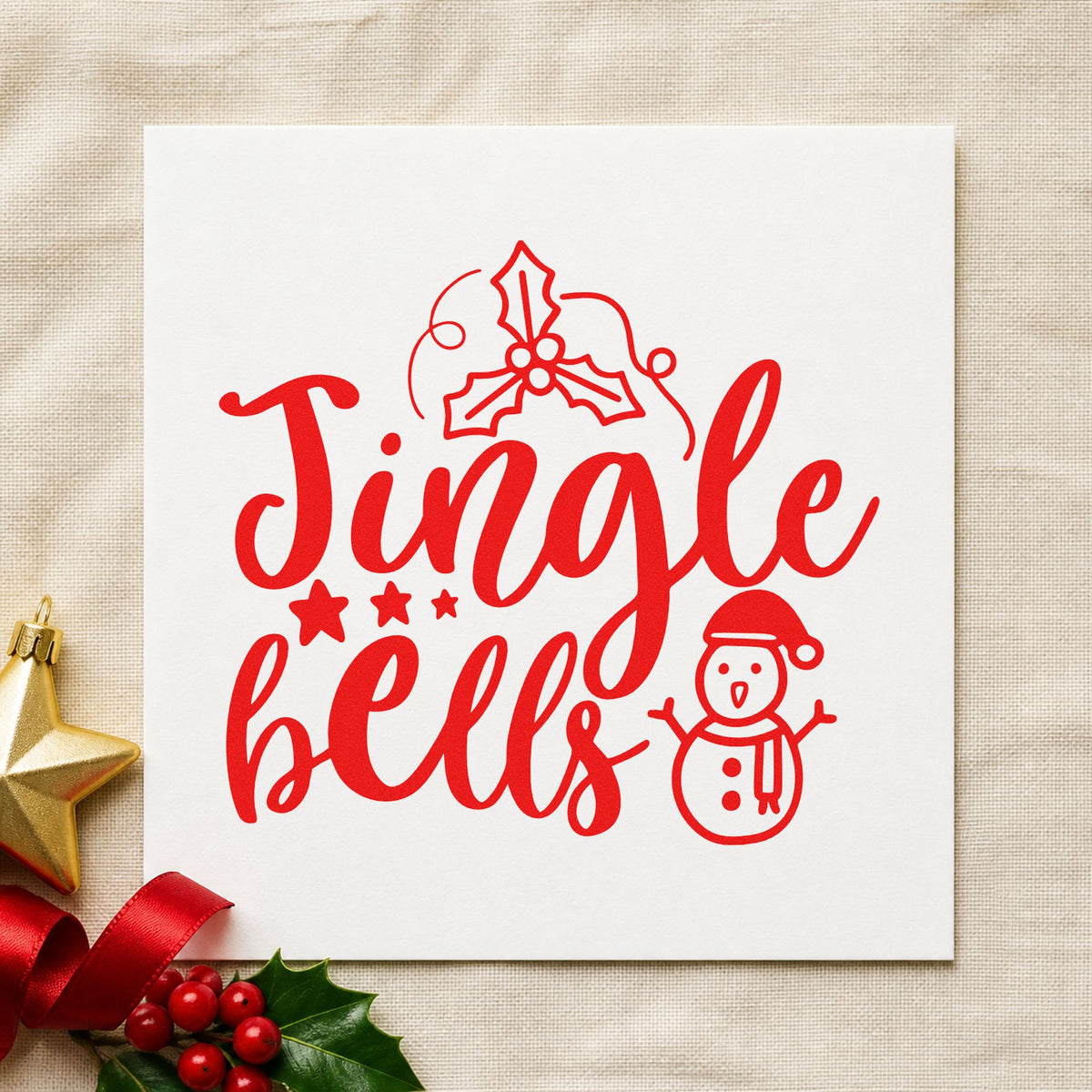 Jingle Bells Holly Snowman craft stamp in red ink on cardstock, an easy option for muffler edge printing.