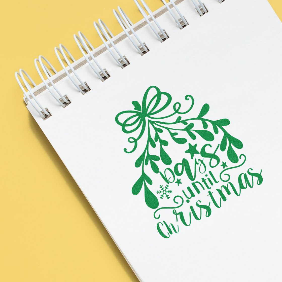 Days Until Christmas Mistletoe rubber stamp shown in green ink, stamped for projects such as hanging album page.