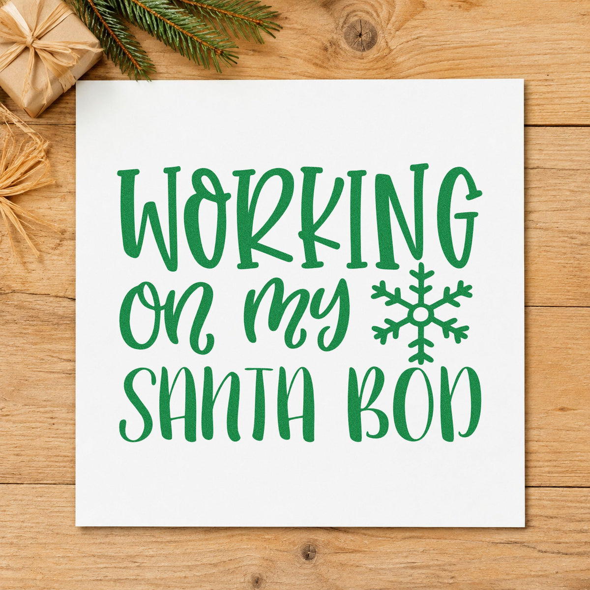 Working On My Santa Bod craft stamp imprinted in green ink on paper, a design suited to framed couch wall.