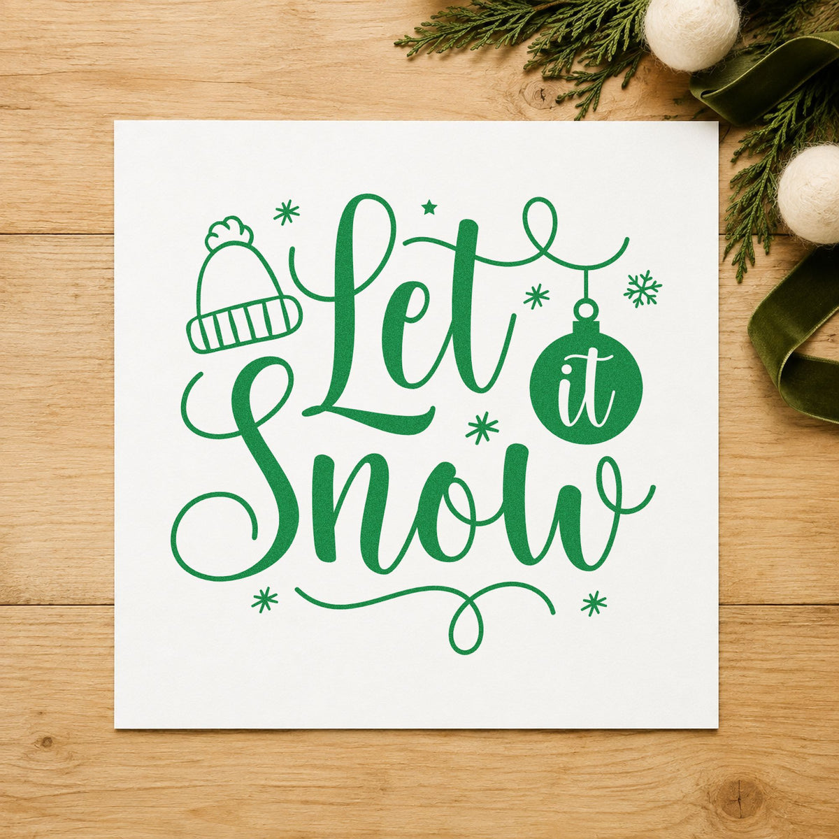 Let It Snow Winter Hat craft stamp imprint in green ink on a handmade project, one idea being hat rack price tags.