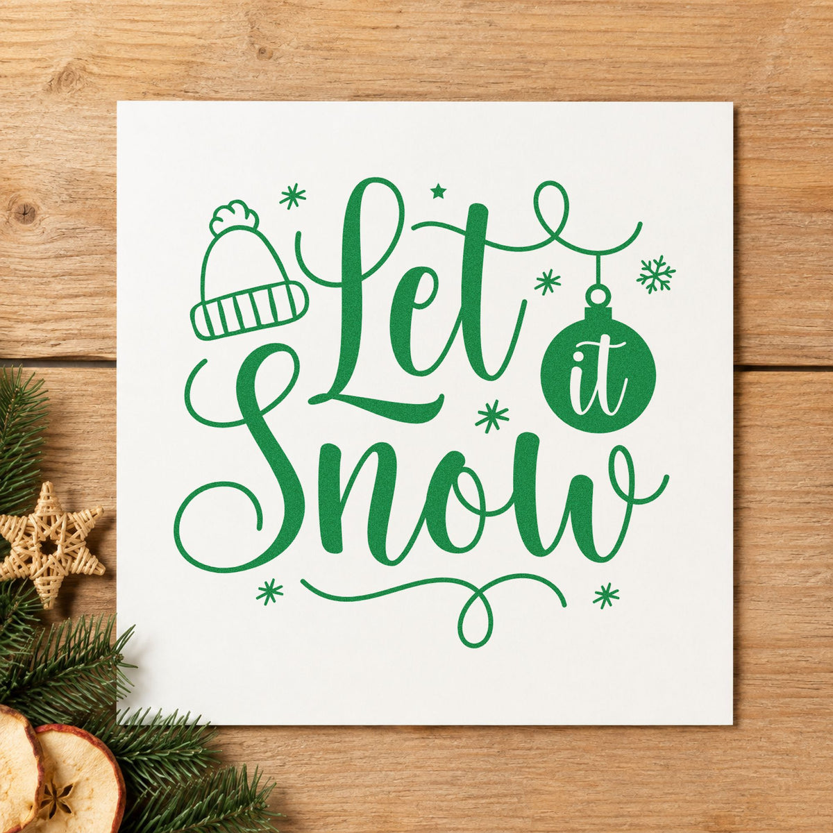 Let It Snow Winter Hat craft stamp imprint in green ink on a handmade project, one idea being sale rack placards.