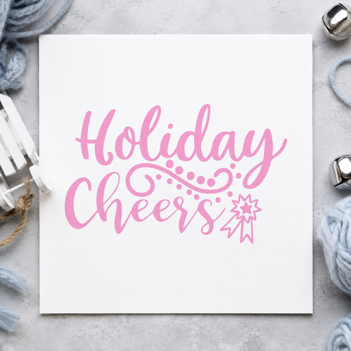 Holiday Cheers Starburst Flourish craft stamp in purple ink on cardstock, an easy option for small party album.